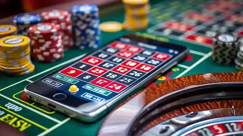 FHMBet အွန်လိုင်း ကတ်ဂိမ်းများ Baccarat နှင့် Poker ကစားနေသည့် မြင်ကွင်း